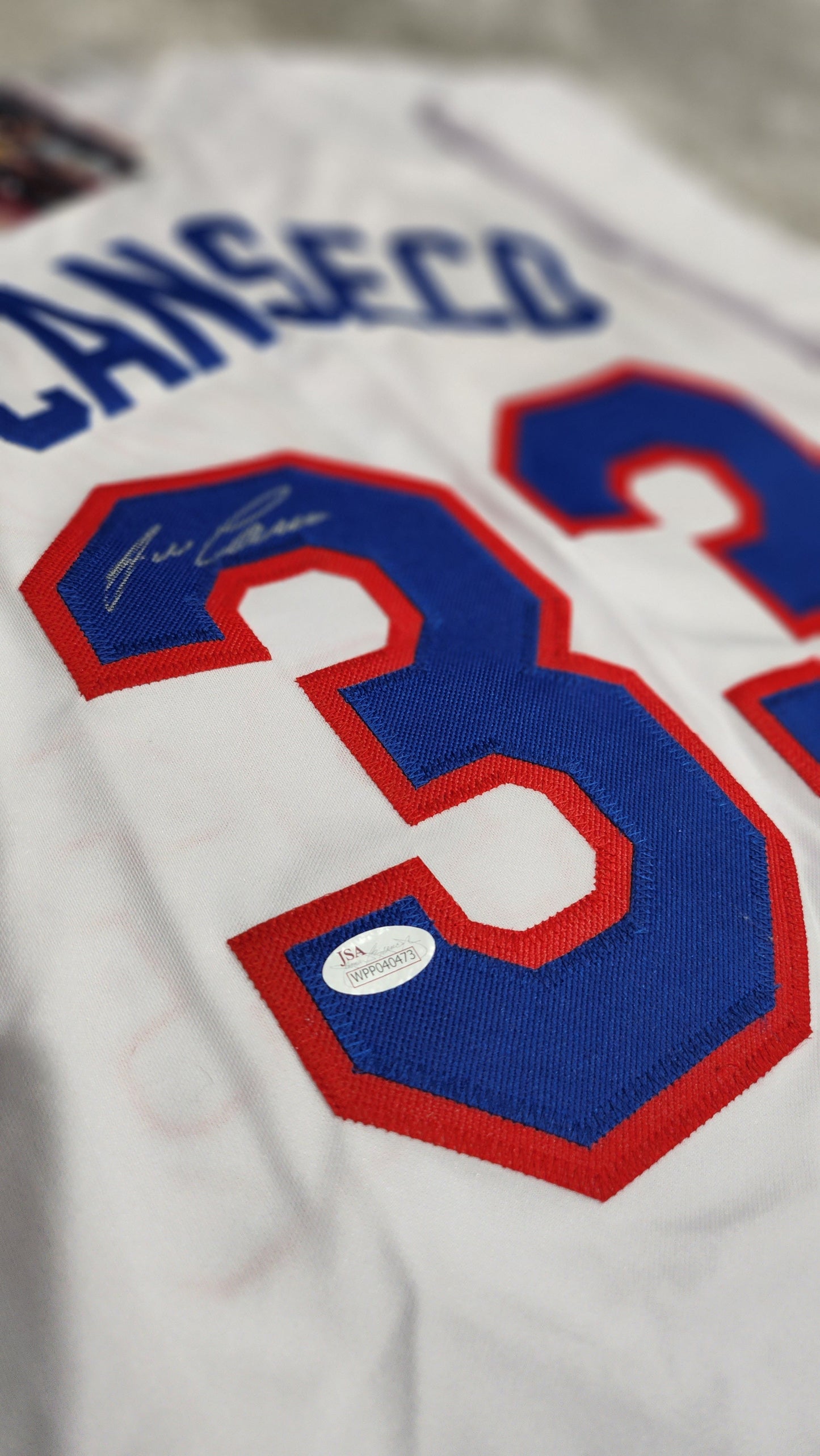 Jose Canseco Autographed Texas Rangers Jersey w/ JSA COA | Bollëku